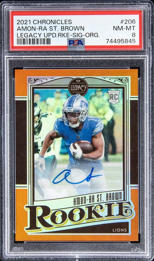 2021 Chronicles Amon - Ra St. Brown Legacy Update Signature #206 card image
