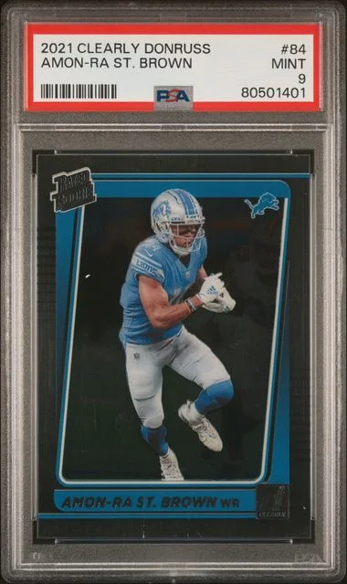 2021 Panini Amon-Ra St. Brown Clearly Donruss Rated Autograph Blue #84 card image