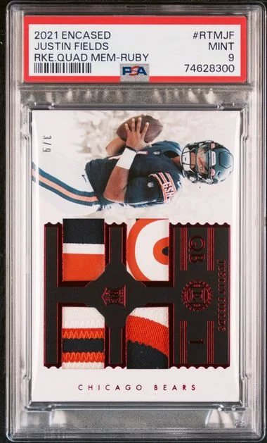 2021 Panini Encased Justin Fields Quad Memorabilia Ruby #RTM-JF card image