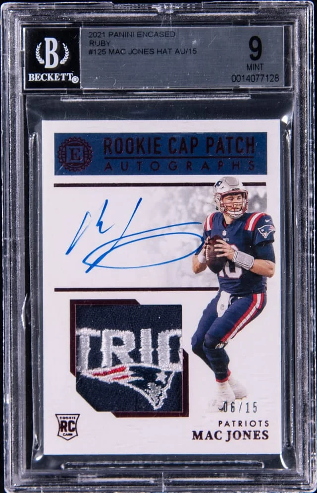 2021 Panini Encased Mac Jones Cap Patch Autographs Ruby #125 card image