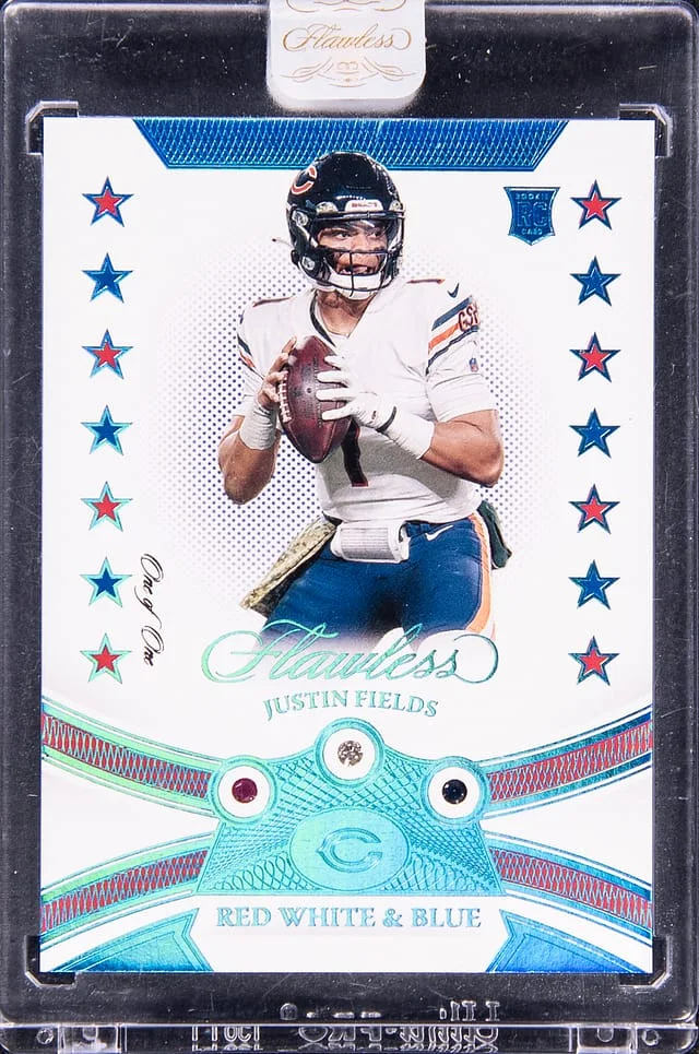 2021 Panini Flawless Justin Fields Gems Relic - Panini Encased Red White & Blue Gems #RWB4 card image