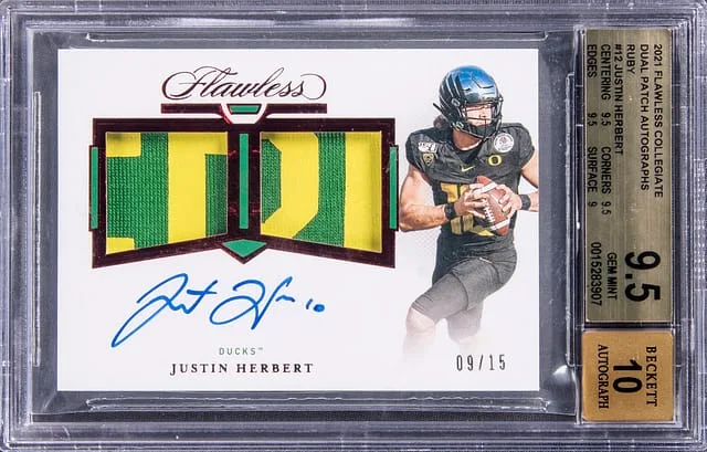 2021 Panini Flawless Justin Herbert Collegiate Dual Patch Autographs Ruby #DPA-JH card image