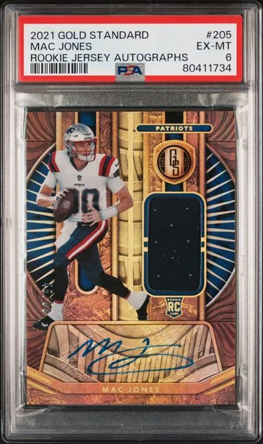 2021 Panini Gold Standard Mac Jones Jersey Autographs #205 card image