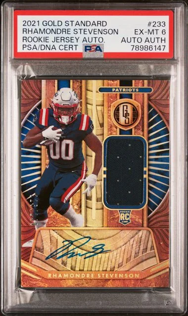 2021 Panini Gold Standard Rhamondre Stevenson Jersey Autographs #233 card image