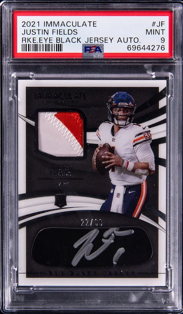 2021 Panini Immaculate Collection Justin Fields Eye Black Jersey Autographs #JF card image