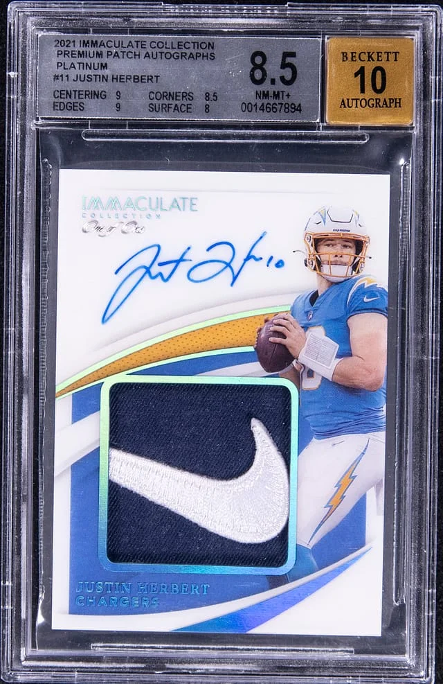 2021 Panini Immaculate Collection Justin Herbert Premium Patch Autographs Platinum #PPA-DC card image