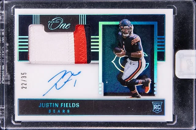 2021 Panini Justin Fields One Patch Autograph Blue #119 card image