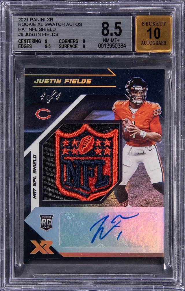 2021 Panini Justin Fields XR XL Swatch Autographs Hat NFL Shield #RXA-JFI card image