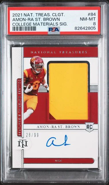 2021 Panini National Treasures Amon-Ra St. Brown Collegiate College Materials Signatures #84 card image
