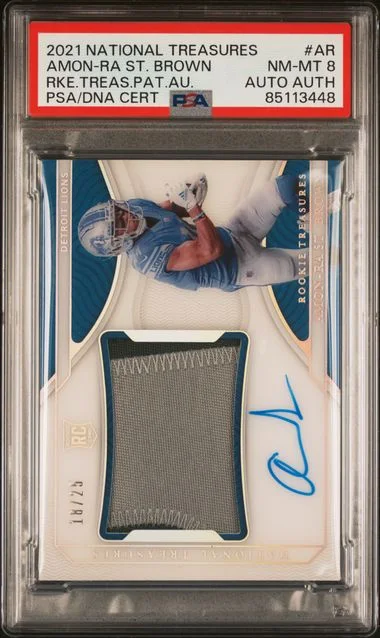 2021 Panini National Treasures Amon-Ra St. Brown Treasures Patch Autographs #AR card image