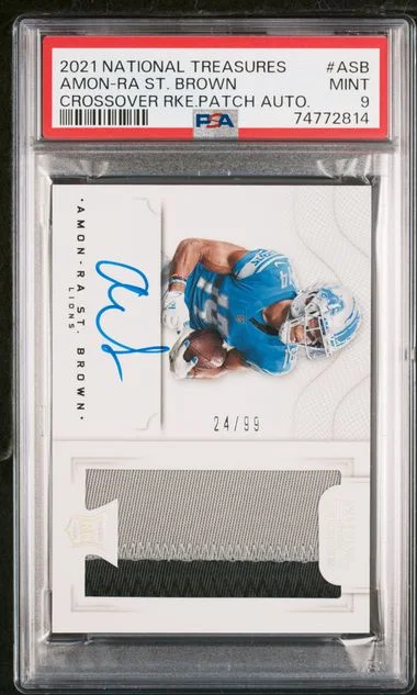2021 Panini National Treasures Amon-Ra St. Brown Crossover Patch Autograph #CRS-ASB card image