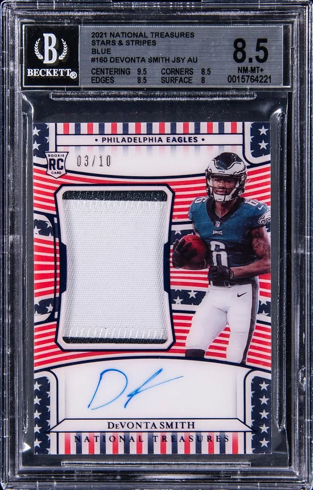 2021 Panini National Treasures DeVonta Smith Patch Autograph Stars & Stripes Blue #160 card image