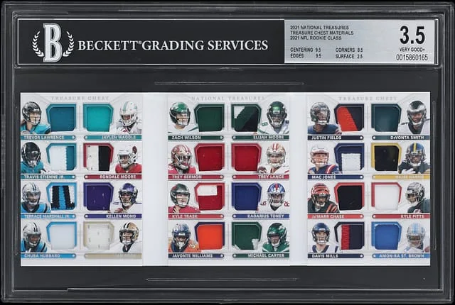 2021 Panini National Treasures Featuring Trevor Lawrence, Justin Fields. Ja'Marr Chase Treasure Chest Materials 2021 Class #TC-ROOK card image