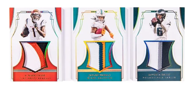 2021 Panini National Treasures Ja'Marr Chase/Jaylen Waddle/DeVonta Smith Patch Raw Triple Booklet #RTBWR card image