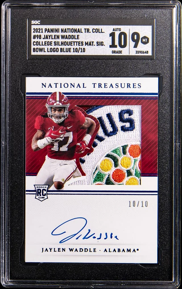 2021 Panini National Treasures Jaylen Waddle Collection College Silhouettes Material Signatures Bowl Logo Blue #98 card image