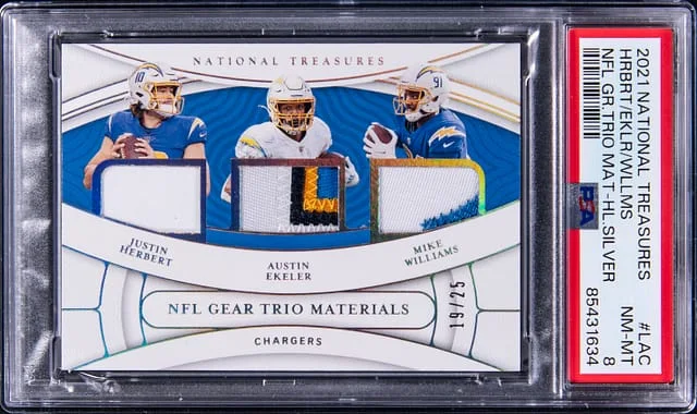2021 Panini National Treasures Justin Herbert/Austin Ekeler/Mike Williams NFL Gear Trio Materials Holo Silver #TM-LAC card image