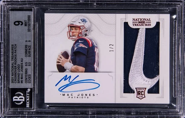2021 Panini National Treasures Mac Jones Crossover Patch Autograph (RPA) #CRS-MJ card image
