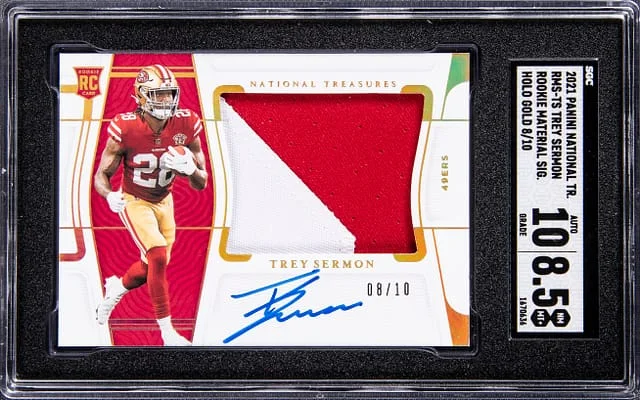 2021 Panini National Treasures Material Signatures Holo Gold #RMS–TS Trey Sermon #no-number card image