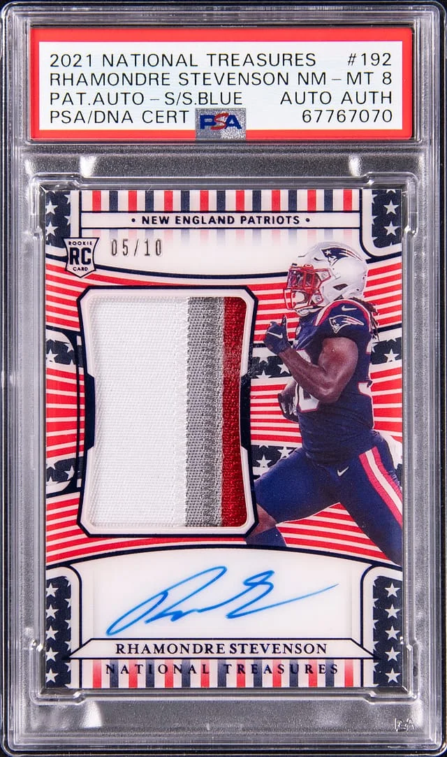 2021 Panini National Treasures Rhamondre Stevenson Patch Autograph (RPA) Stars & Stripes Blue #192 card image