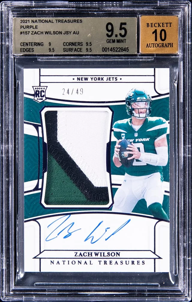 2021 Panini National Treasures Zach Wilson Patch Autograph (RPA) Purple #157 card image