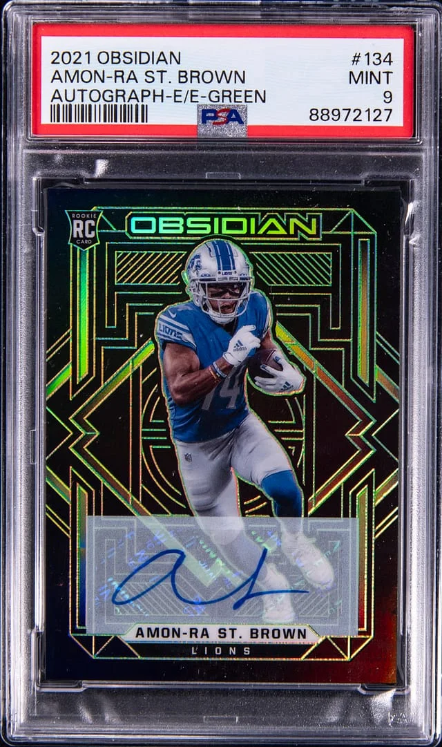 2021 Panini Obsidian Amon-Ra St. Brown Autograph Electric Etch Green #134 card image