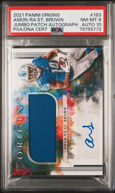 2021 Panini Origins Amon-Ra St. Brown Jumbo Patch Autograph #183 card image