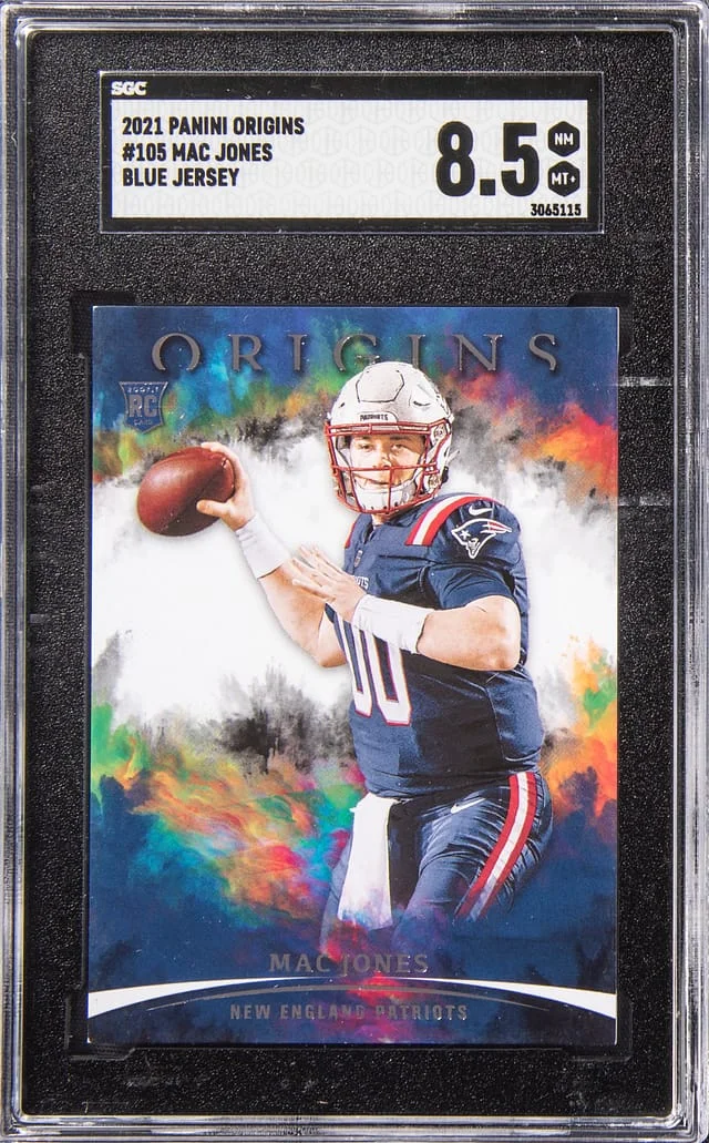 2021 Panini Origins Mac Jones Blue Jersey #105 card image