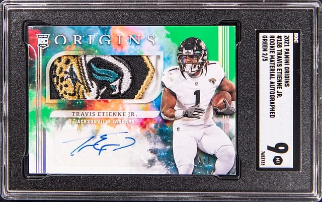 2021 Panini Origins Travis Etienne Jr. Material Autographed #158 card image