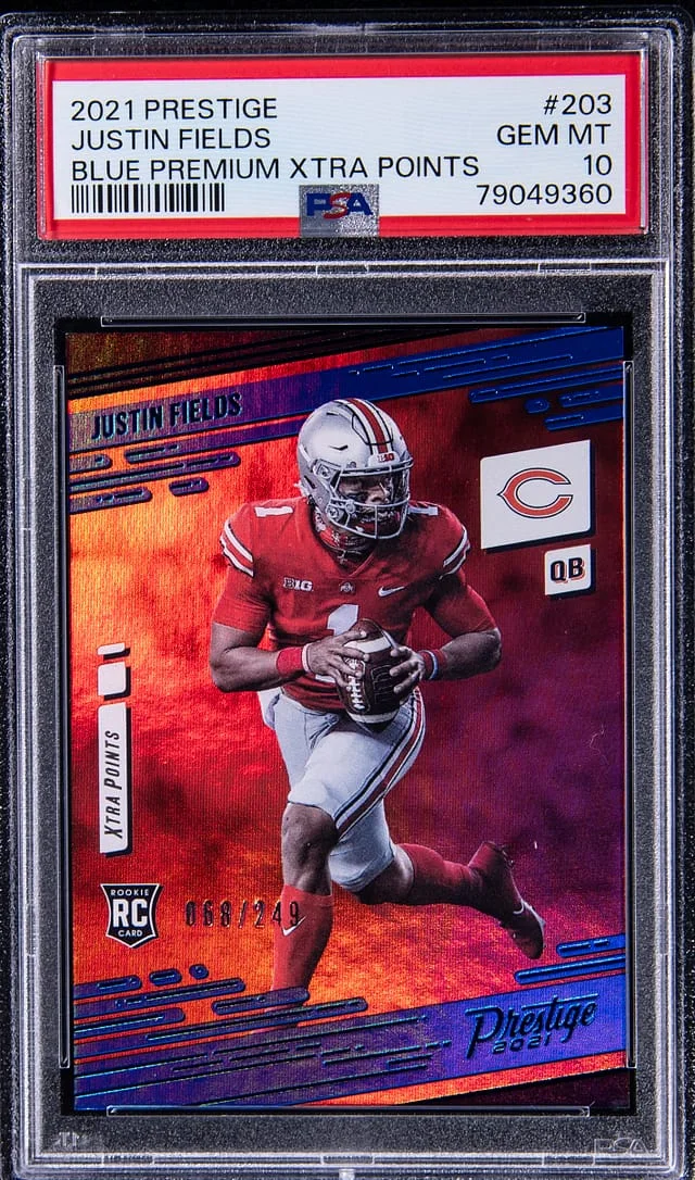 2021 Panini Prestige Justin Fields Blue Premium Xtra Points #203 card image
