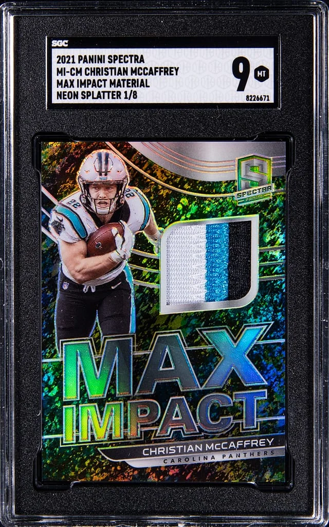2021 Panini Spectra Christian McCaffrey Max Impact Material Neon Splatter #MI-CM card image