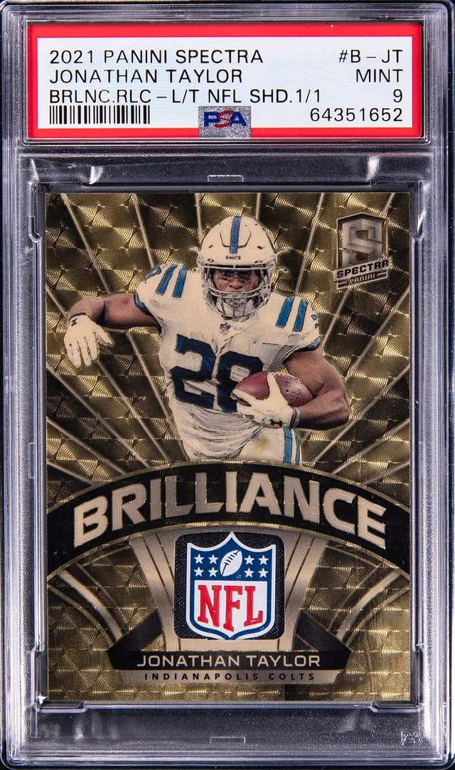 2021 Panini Spectra Jonathan Taylor Brilliance Relic NFL Shield Gold Vinyl #B-JT card image