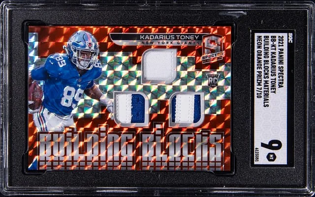 2021 Panini Spectra Kadarius Toney Building Blocks Materials Neon Orange Prizm #BB-KT card image