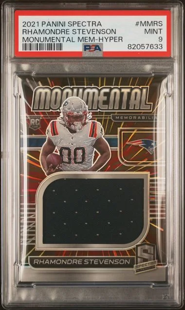2021 Panini Spectra Rhamondre Stevenson Monumental Memorabilia Hyper #MM-RS card image