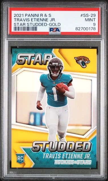 2021 Panini Travis Etienne Jr. Rookies & Stars Star Studded Gold #SS-29 card image