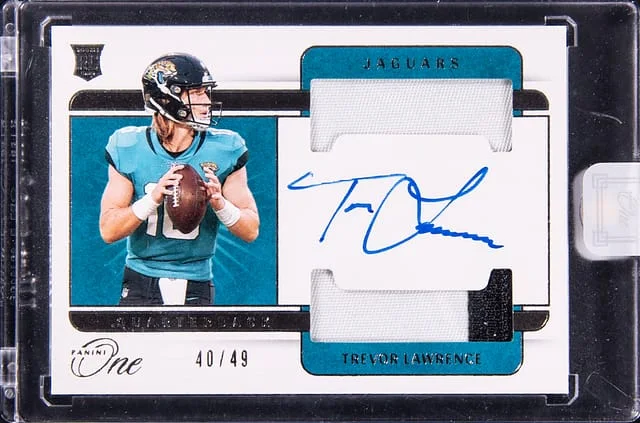 2021 Panini Trevor Lawrence One Dual Patch Autograph #31 card image