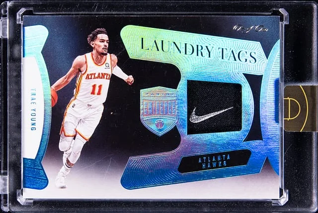 2022-23 Panini Eminence Trae Young Laundry Tags #LT-TYG card image