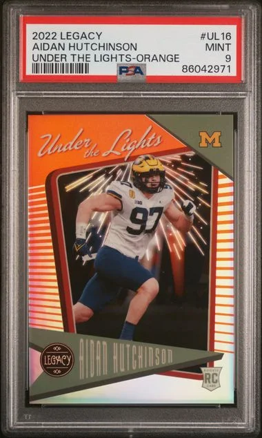 2022 Panini Aidan Hutchinson Legacy Under the Lights Orange #Ul16 card image