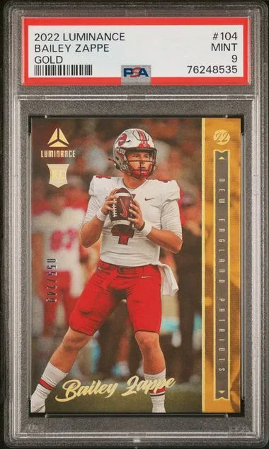 2022 Panini Bailey Zappe Luminance Gold #104 card image