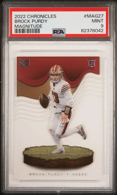 2022 Panini Chronicles Brock Purdy Magnitude #MAG27 card image