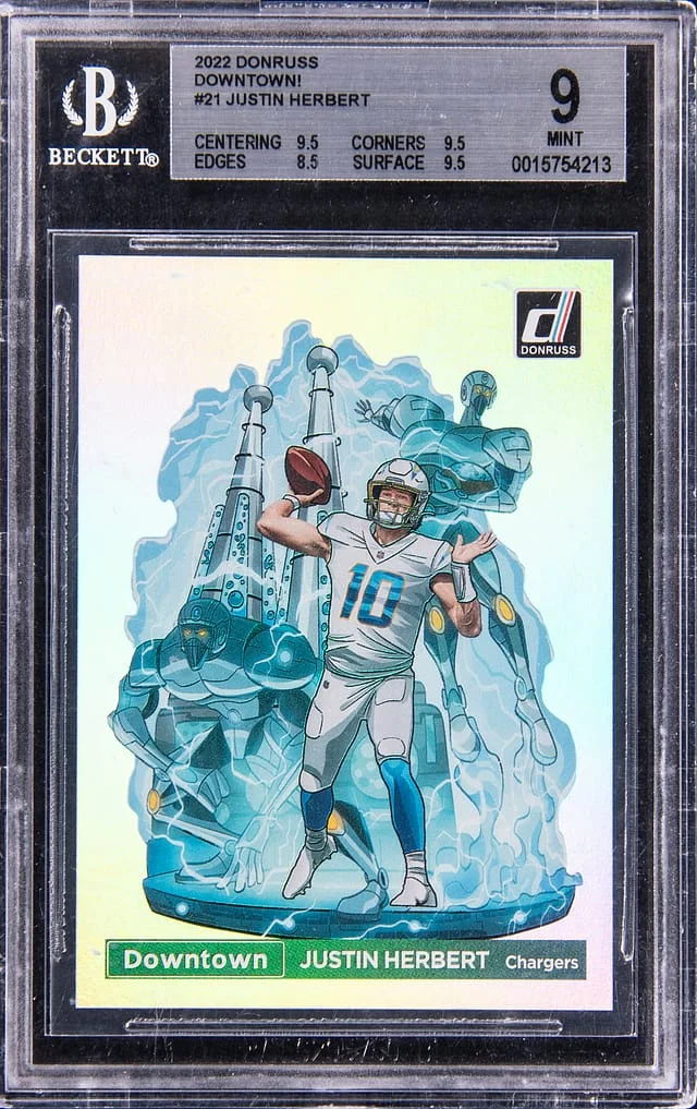 2022 Panini Donruss Justin Herbert Downtown! #21 card image