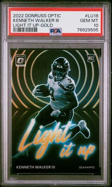 2022 Panini Donruss Optic Kenneth Walker III Light It Up Gold #Lu16 card image