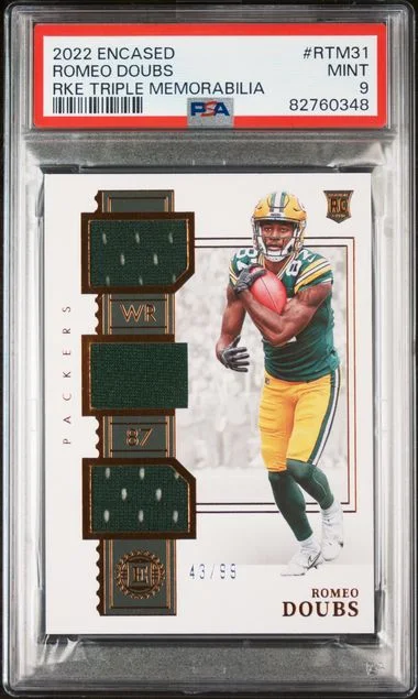 2022 Panini Encased Romeo Doubs Triple Memorabilia #Rtm31 card image