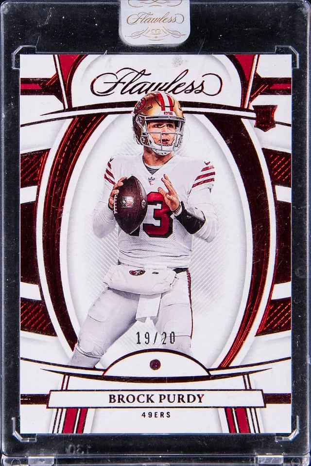 2022 Panini Flawless Brock Purdy Ruby Relic Panini Encased #96 card image