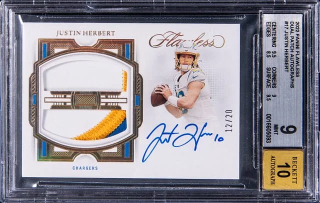 2022 Panini Flawless Justin Herbert Dual Patch Autograph Ruby #DPA-JH card image