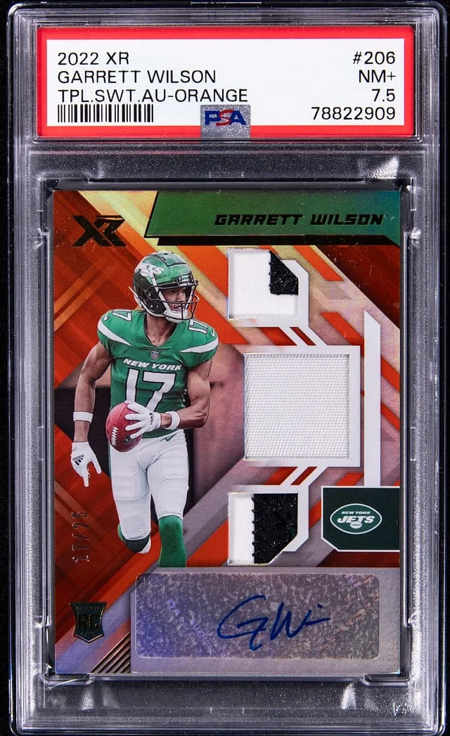 2022 Panini Garrett Wilson XR Triple Swatch Autograph Orange #206 card image