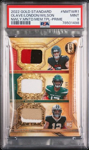 2022 Panini Gold Standard Chris Olave/Drake London/Garrett Wilson Newly Minted Memorabilia Triples Prime #Nmtwr1 card image