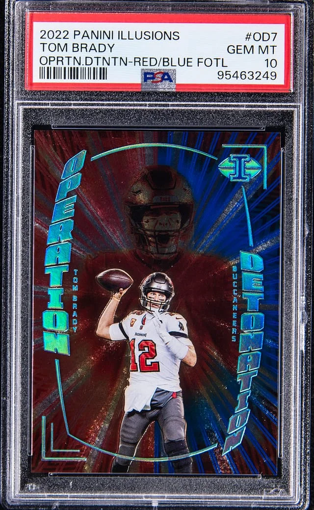 2022 Panini Illusions Tom Brady Operation Detonation Red/Blue FOTL #OD-7 card image