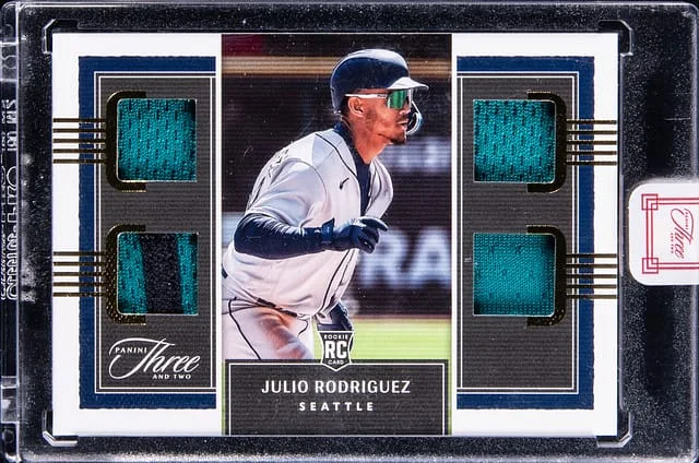 2022 Panini Julio Rodriguez Patch - Panini Encased Three and Two Quad Jerseys Gold #RQJ-JR card image