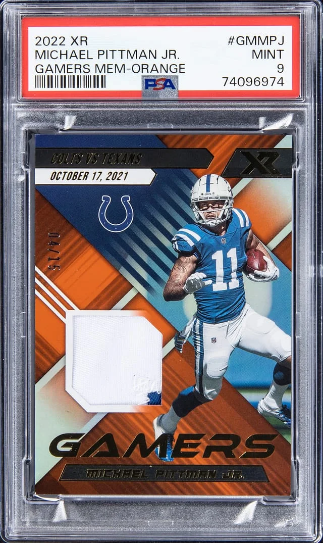2022 Panini Michael Pittman Jr. XR Gamers Memorabilia Orange #GMMPJ card image