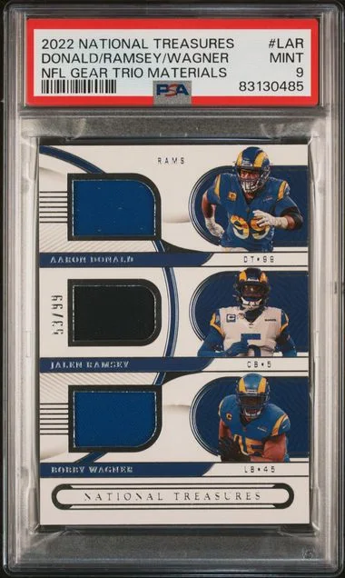 2022 Panini National Treasures Aaron Donald/Bobby Wagner/Jalen Ramsey NFL Gear Trio Materials #LAR card image